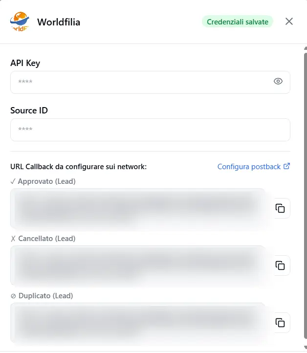 The Worldfilia card: at the top API Key and Source ID, below the three callback URLs (approved/cancelled/duplicate) to paste in the panel