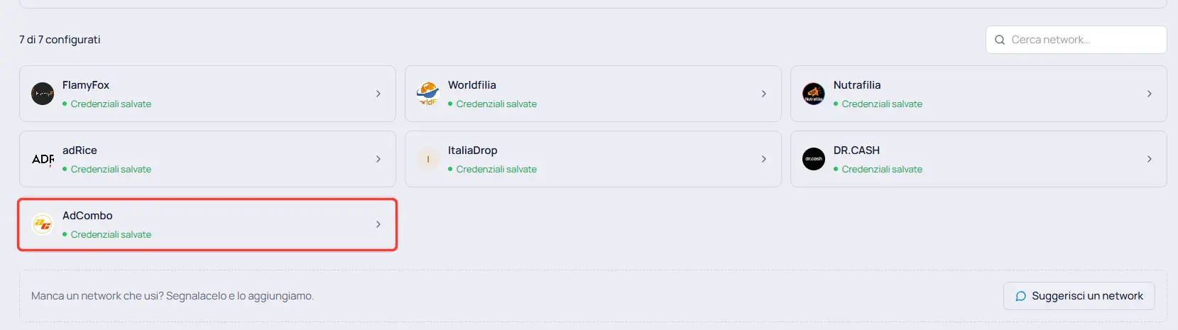 The Network Credentials grid: the AdCombo card with its green "Credentials saved" dot