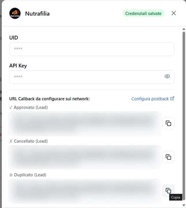 The Nutrafilia card: at the top UID and API Key, below the three callback URLs (approved/cancelled/duplicate) to paste in the panel